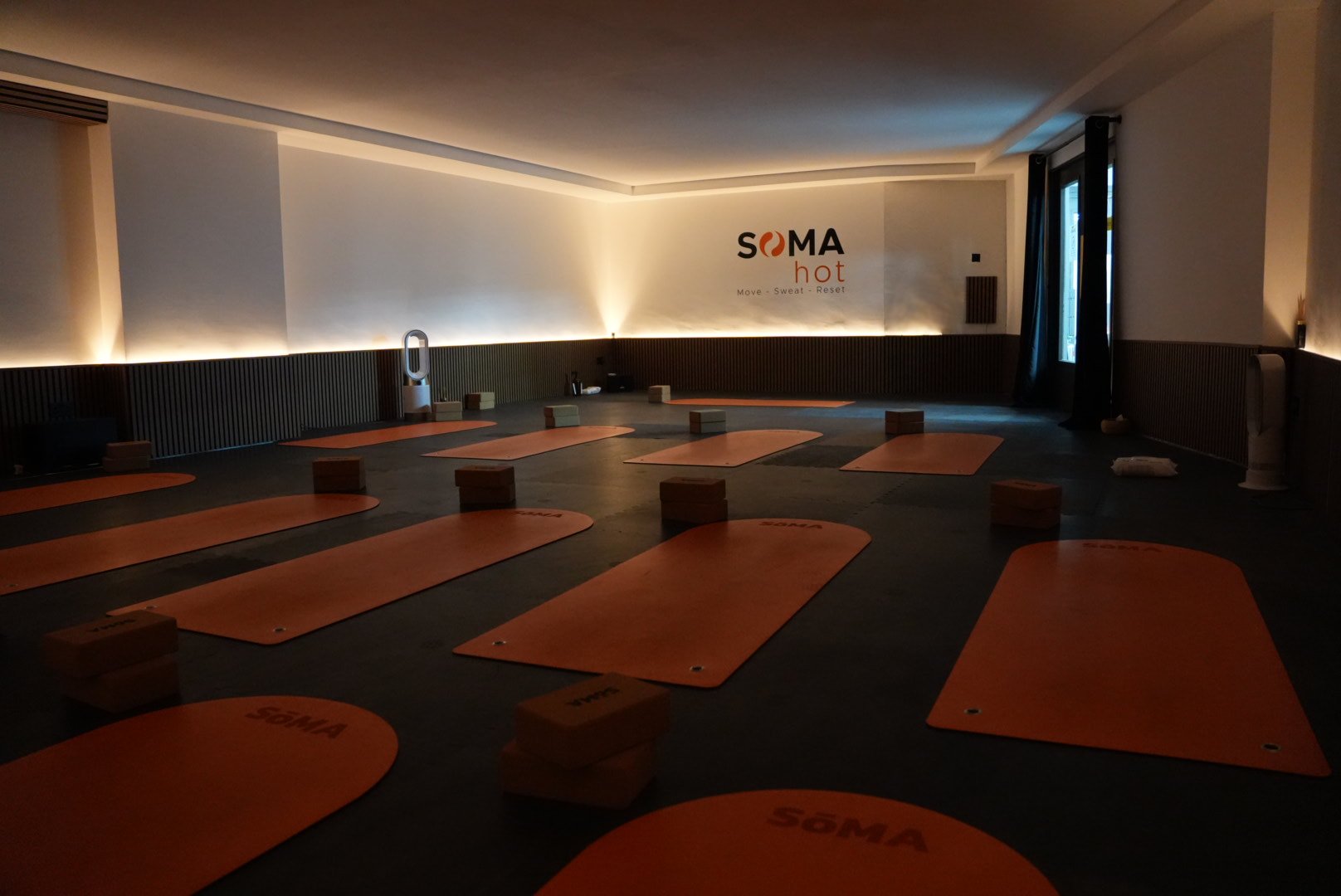 Hot yoga class in the heated Soma Club Durham studio